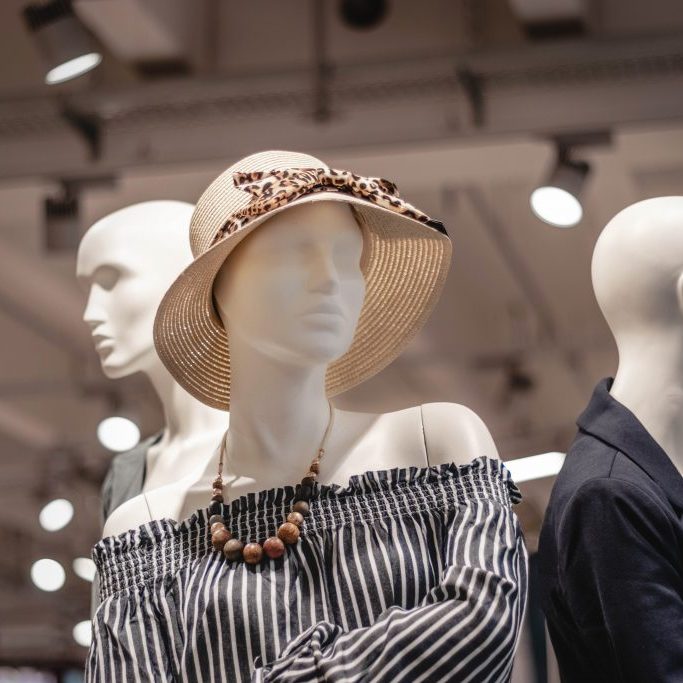 store mannequins with women's clothing and accessories